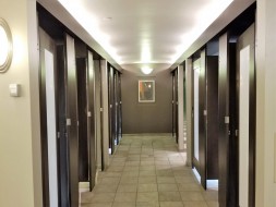 Jack Singer Concert Hall Ladies Lobby washrooms (After) - Ironwood Phenolic with Acrylic Inserts